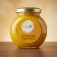 frasco de vidrio con tapa dorada con miel potenciada con curcuma y pimienta