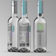 3 botellas de agua de lluvia purificada.